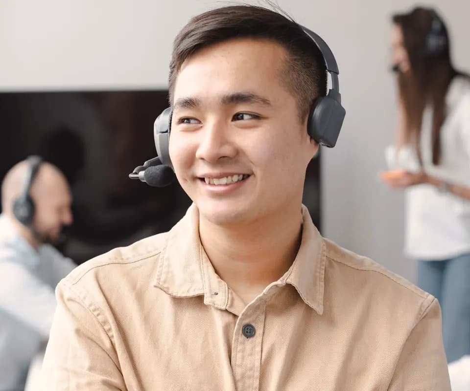 Support agent wearing a headset