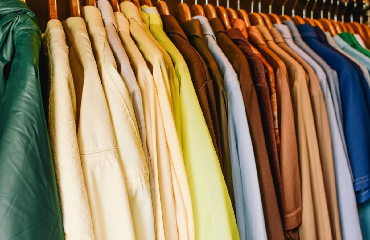 Shirts on wooden hangers