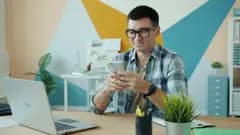 Seller checking a phone